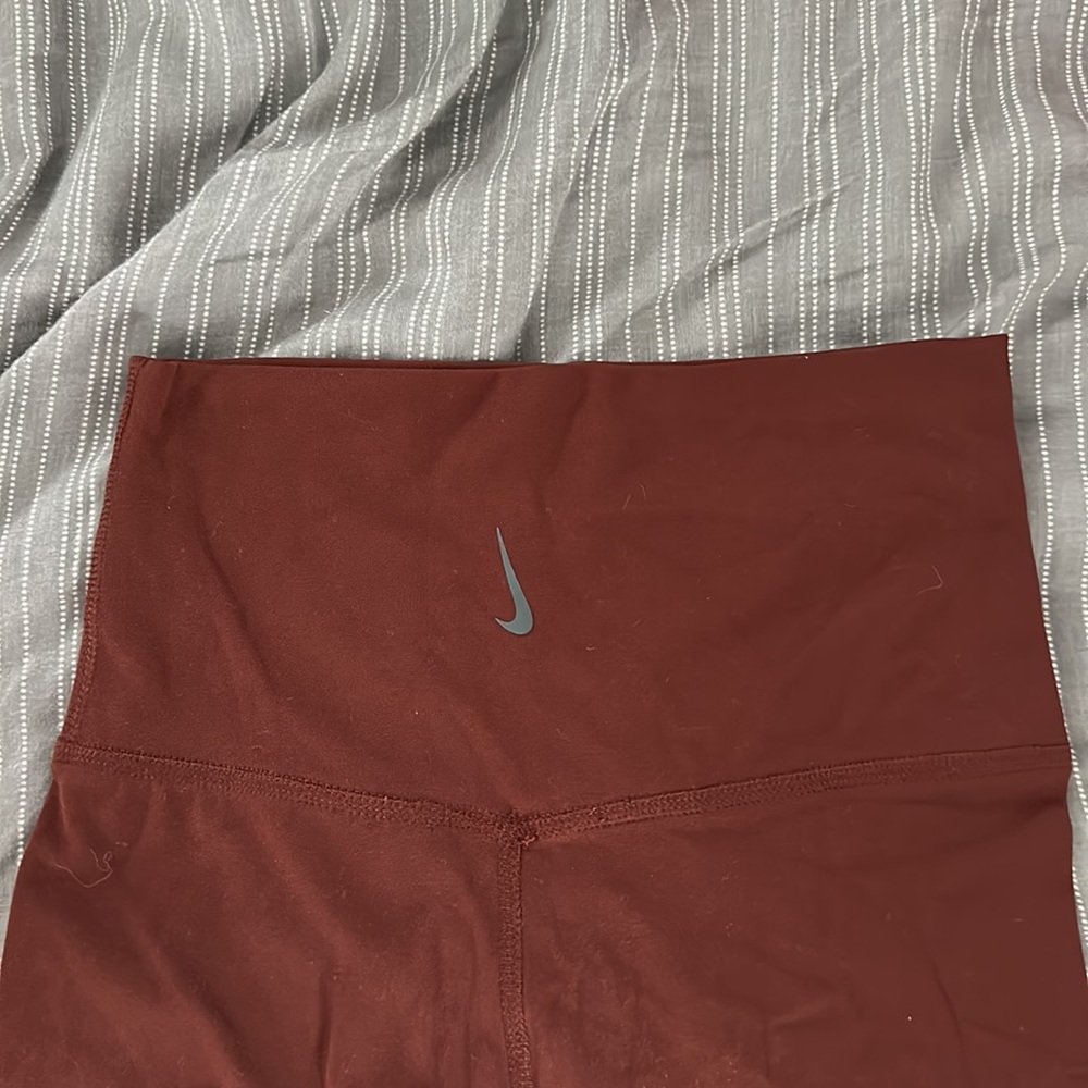 Nike yoga biker shorts, maroon/ red color, size women’s extra small